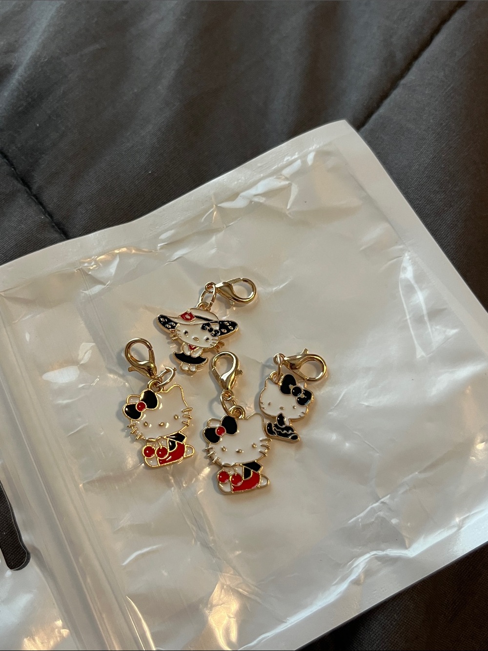 Sanrio Hello Kitty Gold-Tone Black & White Enamel zipper pulls (4)